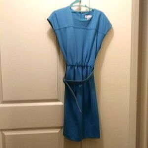 Ocean blue sleeveless dress with a belt